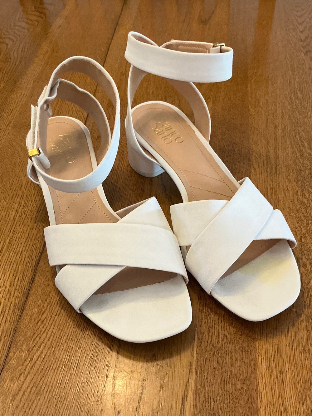 Woman’s Franco Sarto white block heel sandal. Size 9W. Manmade. Velcro strap.